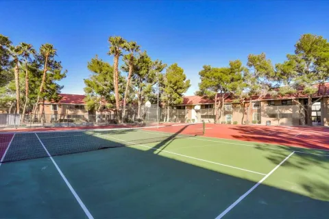 Tennis court and apartment buildings at Summerlin Entrada